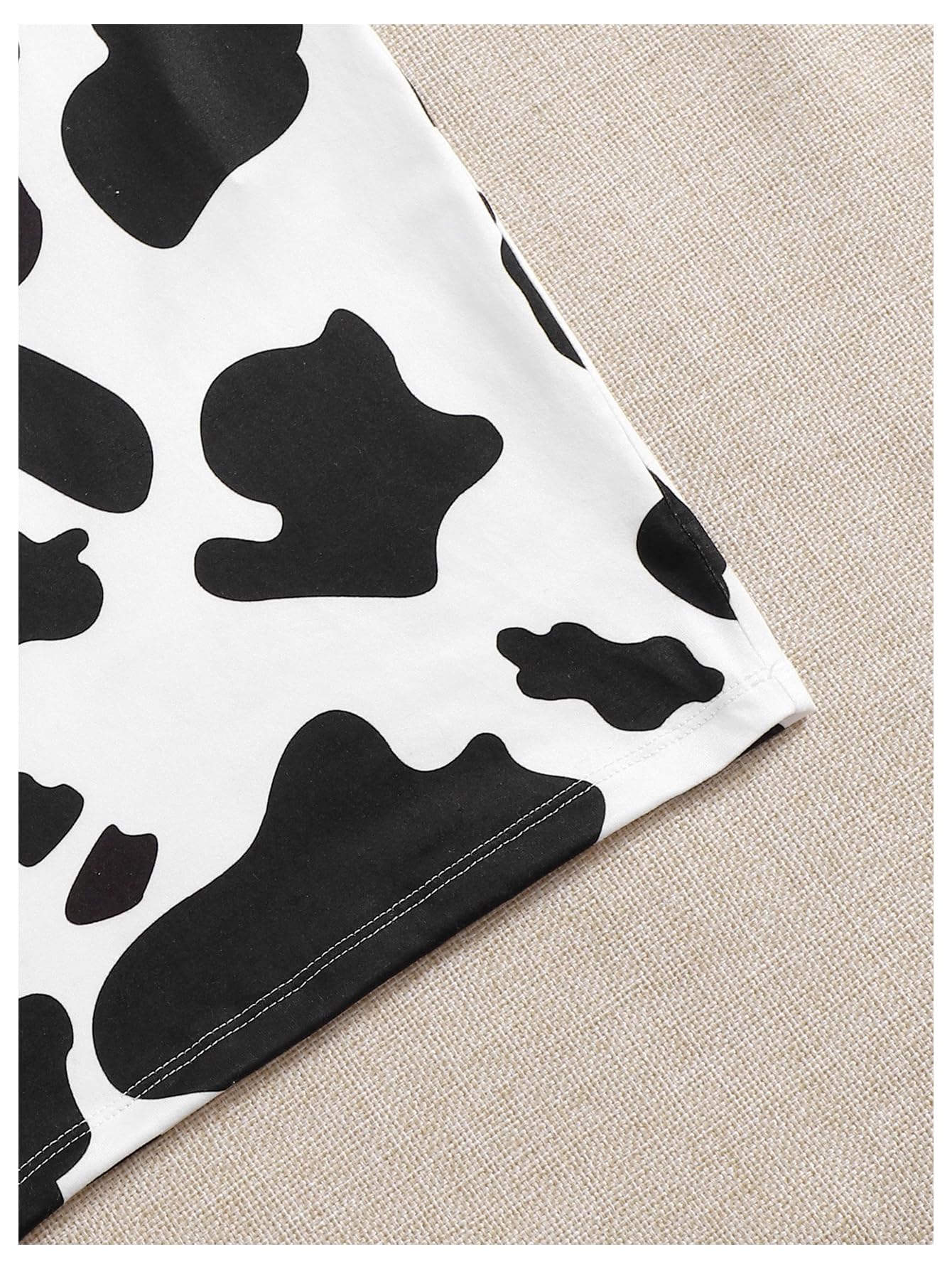 WDIRARA Women's Cow Print Bodycon Mini Cami Dress Spaghetti Strap Dresses thumbnail 5
