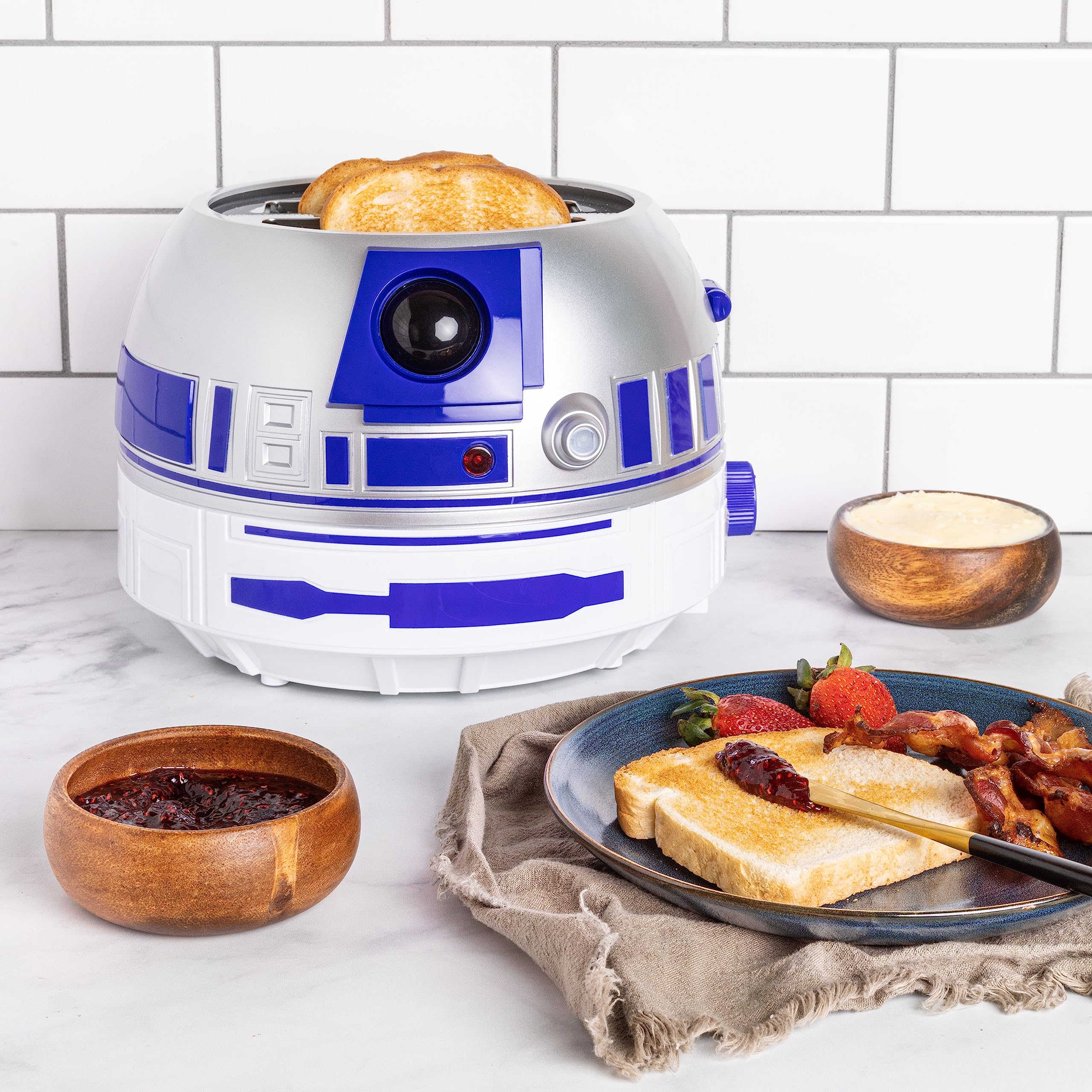 Uncanny Brands Star Wars R2D2 Deluxe Toaster - Lights-Up and Makes Sounds Like Artoo: Star Wars R2-D2